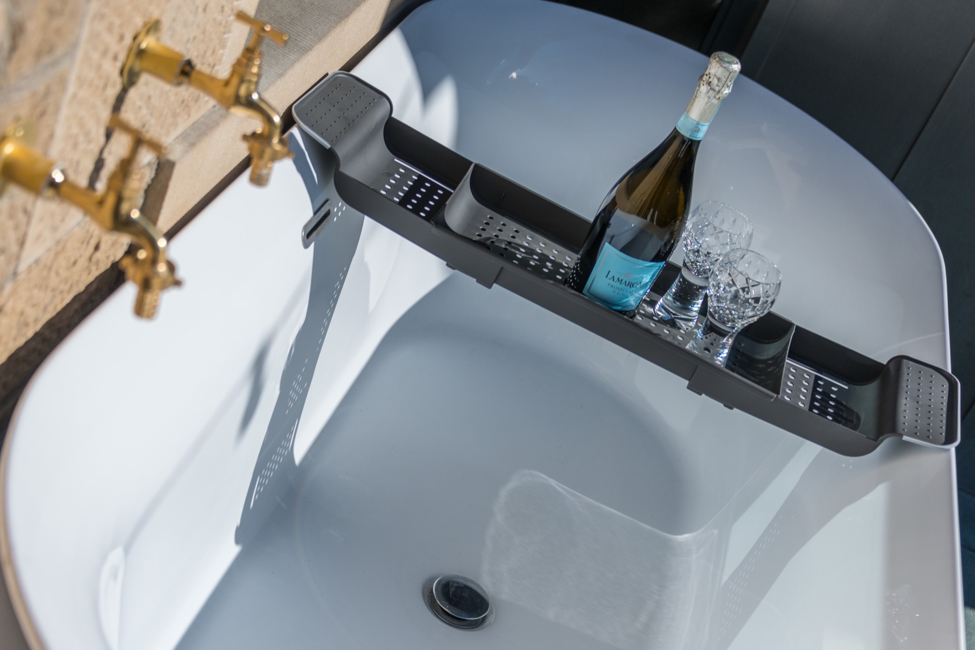 Outdoor bath with champagne tray, overhead view